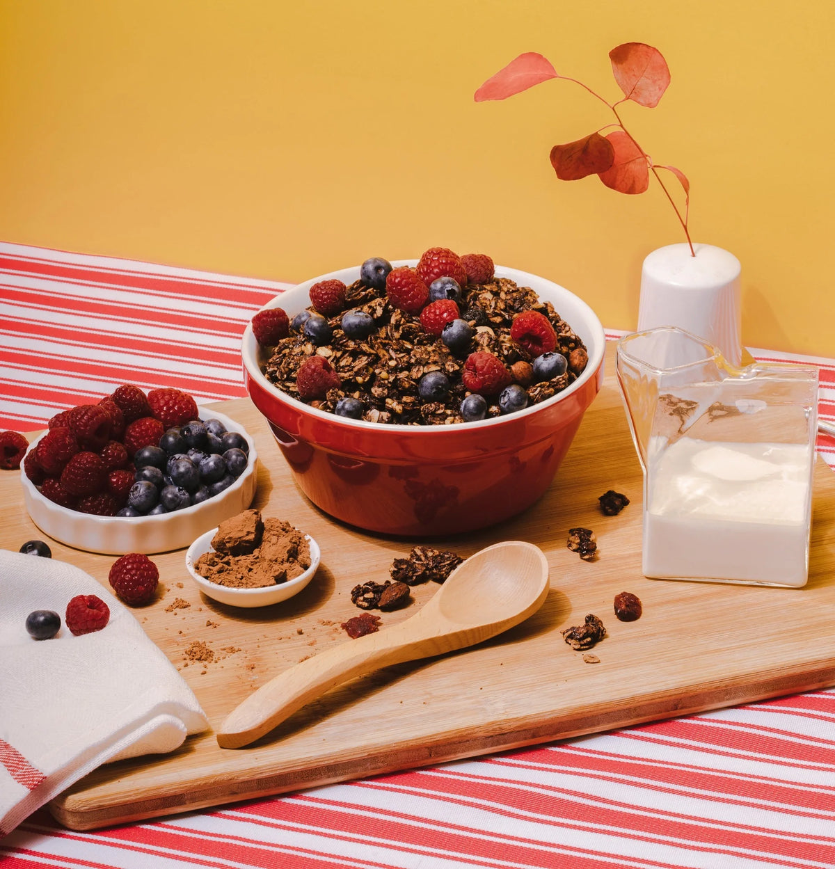  Amazin’ Graze granola bowl with berries and milk for a colorful, fiber-rich breakfast.