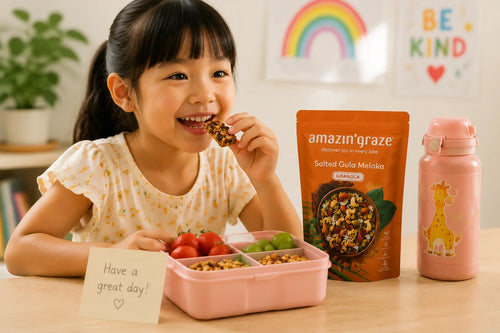 Parent and child preparing healthy snacks together in a kitchen with colorful fruits and wholesome ingredients.